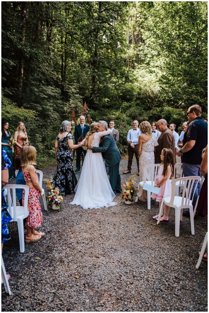 Ceremony at Horning's Hideout Lakeside Forest Wedding Summer of 2023